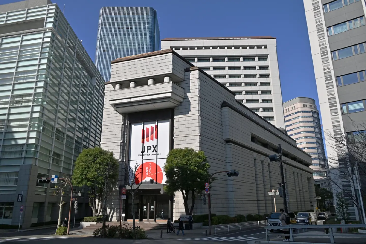 Dollar hits 2-month low below 154 yen in Tokyo