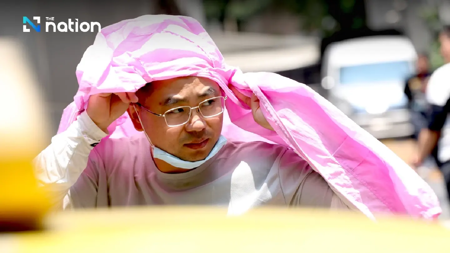 Hot spell grips upper Thailand as South braces for downpours
