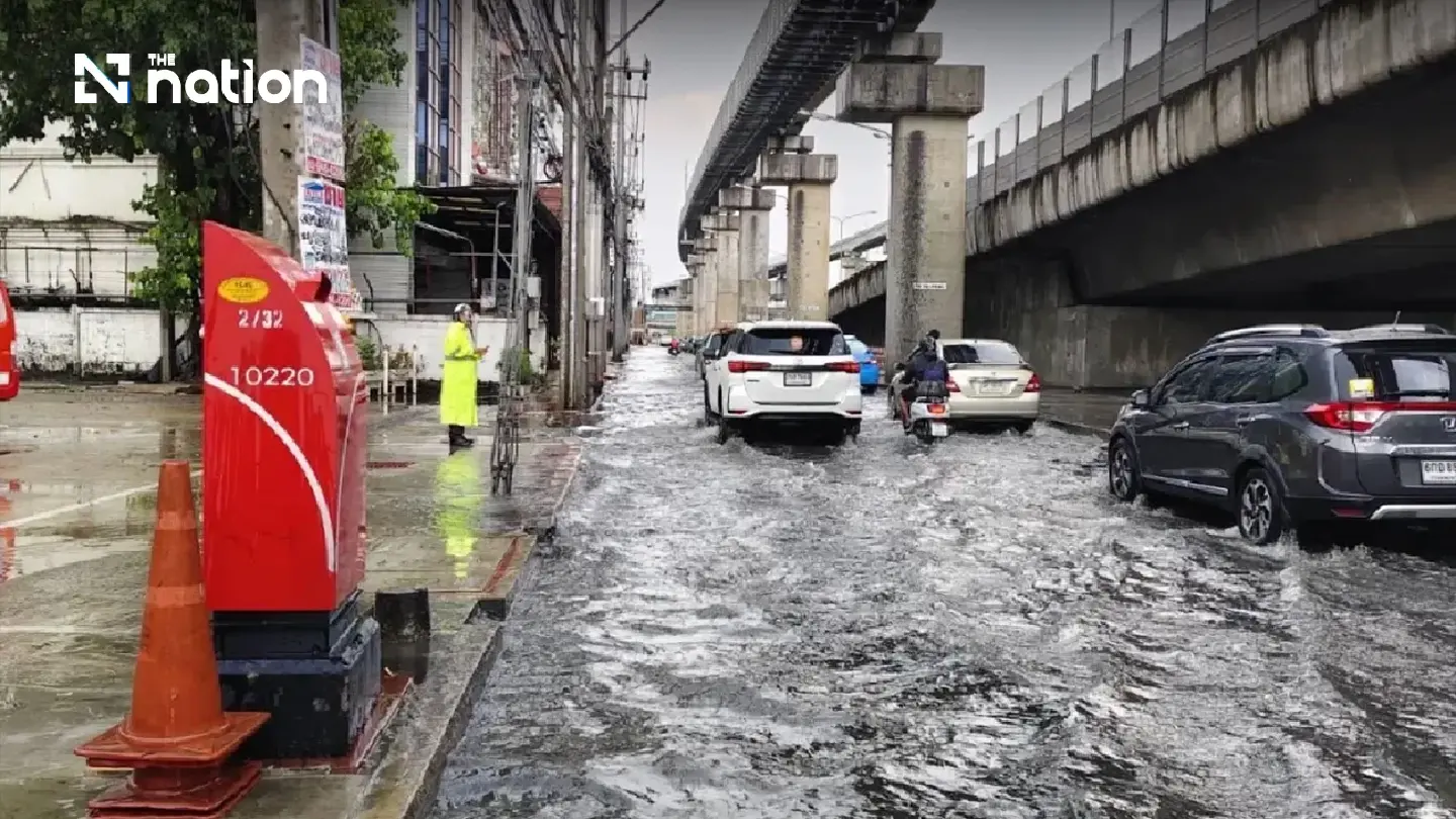 Heavy rain floods Bangkok roads and slows traffic after midday