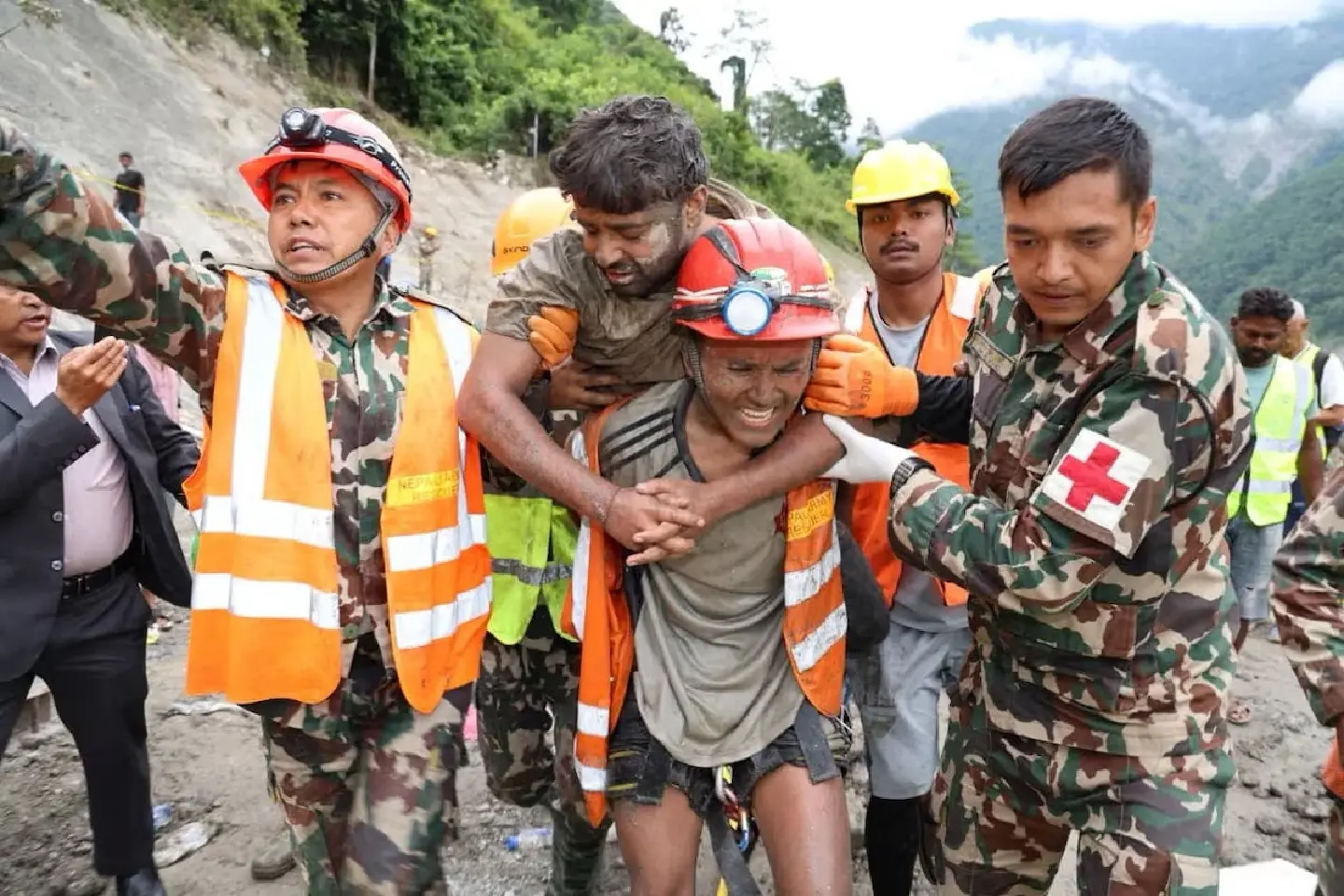 Nepal foreman rescued after nine days in flooded tunnel says he stayed behind to help colleagues escape Nepal foreman rescued after nine days in flooded tunnel says he stayed behind to help colleagues escape