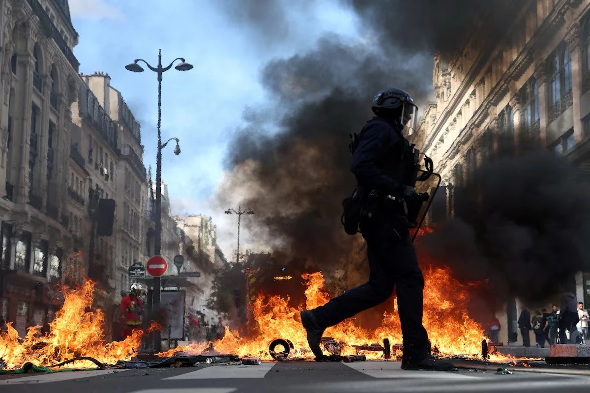 France reports 1,200 arrests during protests over rising living costs